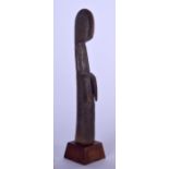 A BURKINA FASO MOSSI PEOPLE CARVED WOODEN FIGURE, zoomorphic in form. 26 cm high.