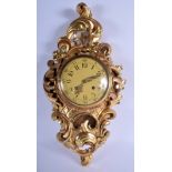 A CONTINENTAL GILTWOOD CARTEL CLOCK. 56 cm x 26 cm.