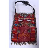 AN EARLY/MID 20TH CENTURY TURKESTAN EMBROIDERED SASH, formed with white metal and jewelled decorati