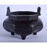 A 19TH CENTURY CHINESE TWIN HANDLED BRONZE CENSER bearing Xuande marks to base. 11 cm wide, interna