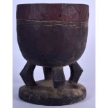 A WEST AFRICAN CARVED WOODEN OINTMENT POT, subtle carved geometric decoration to body. 23.5 cm x 18
