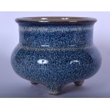 A CHINESE PORCELAIN CENSER BEARING QIANLONG MARKS, formed with a mottled blue drip glaze. 11 cm x 1