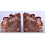 A PAIR OF HARDSTONE AGATE BOOKENDS, naturalistic in form. 15 cm x 15 cm.