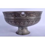 A LARGE 17TH CENTURY SAFAVID TINNED COPPER BOWL Persia, decorated with extensive scripture and foli