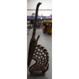 A BAMANA CHI WARA WOODEN HEADDRESS, formed with copper strapwork. 108 cm high.