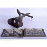 AN ANTIQUE STEREOSCOPE with matching slides. (qty)