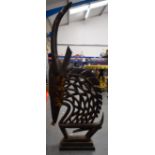 A LARGE MALIAN BAMBARA WOODEN TRIBAL STATUE, carved in the form of a stylised gazelle. 148 cm high.