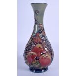 A MOORCROFT FRUIT AND FINCHES VASE. 17 cm high.