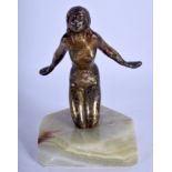 AN ART DECO BRONZE FIGURE OF A KNEELING FEMALE modelled upon a canted onyx base. 8 cm x 11 cm.