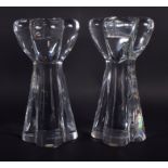 A PAIR OF FRENCH BACCARAT GLASS CANDLESTICKS. 18 cm high.