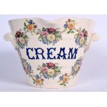 A LARGE ANTIQUE CREAM BUCKET, decorated with sprays of foliage. 20 cm x 32 cm.
