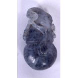 AN EARLY 20TH CENTURY CHINESE LAVENDER JADE PENDANT, carved in the form of a fruit pod. 3.25 cm lon