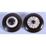 A PAIR OF ART DECO BAKELITE BROOCHES. 4.25 cm wide.