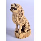 A FINE 18TH CENTURY JAPANESE EDO PERIOD CARVED IVORY SEAL formed as a seated Buddhistic lion. 8 cm