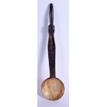 A 19TH CENTURY CONTINENTAL CARVED HORN FOLK ART FIGURAL SPOON. 29 cm long.