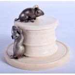 A CHARMING 19TH CENTURY JAPANESE IVORY AND SILVER OKIMONO modelled as three rats clambering over a