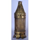 AN UNUSUAL ANTIQUE RHINOCEROS HORN INSET BRASS LAMP, “Docet Umbra”. 33 cm high.