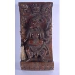 A LOVELY 19TH CENTURY INDIAN CARVED HARDWOOD BUDDHISTIC PANEL depicting deity holding aloft figures