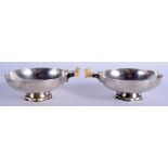 A LOVELY PAIR OF ART DECO SILVER AND IVORY WINE TASTERS by Charles Boyton. 11.9 oz. 12 cm wide.