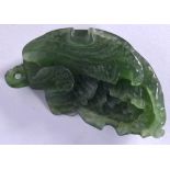 A CHINESE CARVED JADE PENDANT, in the form of a vegetable. 5 cm long.