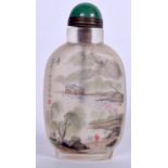 A CHINESE REVERSE PAINTED SNUFF BOTTLE, decorated with landscape scenery, 20th century. 9.5 cm high