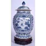 A CHINESE BLUE AND WHITE PORCELAIN VASE AND COVER, decorated with landscapes in panels, together wi