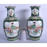 A PAIR OF 1920S CHINESE FAMILLE VERTE PORCELAIN VASES painted with figures within landscapes. 37 cm