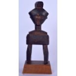 AN IVORY COAST BAULE HEDDLE PULLEY, formed as a standing figure. 25.5 cm high.