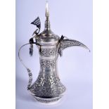 A GOOD MIDDLE EASTERN SOLID SILVER KUFIC EWER decorated with foliage and scrolls. 48.4 oz. 35 cm x