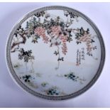 A CHINESE REPUBLICAN PERIOD FAMILLE ROSE PORCELAIN DISH painted with birds amongst calligraphy. 24