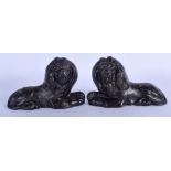 A PAIR OF GEORGE III PAINTED CAST IRON LIONS. 14 cm x 9 cm.
