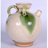 A CHINESE POTTERY EWER, formed with three handles and beige glaze. 17 cm high.