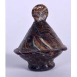 AN EGYPTIAN GLASS OBJECT. 5 cm x 4 cm.