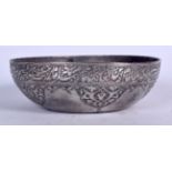 A 19TH CENTURY PERSIAN WHITE METAL BOWL, decorated with calligraphy. 17.5 cm wide.