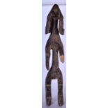 A WEST AFRICAN CARVED WOODEN STATUE, zoomorphic in form. 55 cm high.