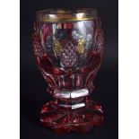 A 19TH CENTURY BOHEMIAN CRANBERRY AND CLEAR GLASS BEAKER. 13 cm high.