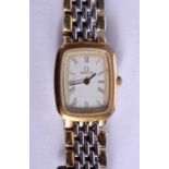 AN OMEGA GOLD PLATED WRISTWATCH. 2 cm wide.
