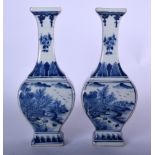 A PAIR OF CHINESE BLUE AND WHITE PORCELAIN VASES BEARING KANGXI MARKS, 20th century. 24 cm high.