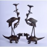 A PAIR OF 19TH CENTURY JAPANESE MEIJI PERIOD BRONZE CANDLESTICKS. 32 cm high.