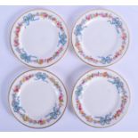 A set of four Royal Worcester porcelain plates, decorated with floral swags and foliage, C1903. (4)