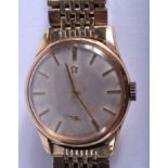 A 1950S 9CT GOLD OMEGA WRISTWATCH. 3.25 cm wide.