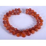 A MIDDLE EASTERN CARNELIAN AGATE NECKLACE. 60 cm long.