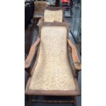 A PAIR OF VINTAGE GARDEN LOUNGER CHAIRS, formed with thatched seats. 74 cm x 130 cm.
