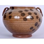 AN EASTERN TWIN HANDLED PORCELAIN BOWL, decorated with speckled body. 14.5 cm wide.