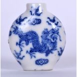 A CHINESE BLUE AND WHITE PORCELAIN SNUFF BOTTLE BEARING QIANLONG MARKS, decorated with a dragon in