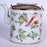 AN EARLY 20TH CENTURY CHINESE FAMILLE ROSE PORCELAIN TEA POT, painted with insects amongst foliage.
