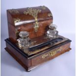 A LARGE VICTORIAN GOTHIC REVIVAL WALNUT GENTLEMAN'S DESK CABINET overlaid in brass work. 36 cm x 30