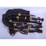 A VINTAGE SET OF SCOTTISH TARTAN BAGPIPES with ivorine and ebony fittings. Box 62 cm long.