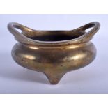 A 19TH CENTURY CHINESE TWIN HANDLED BRONZE CENSER bearing Xuande marks to base. 12 cm wide , intern