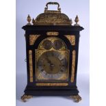 A LARGE EARLY 19TH CENTURY MUSICAL EBONISED BRACKET CLOCK with matching bracket, smothered in gilt